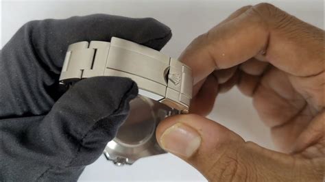 how to adjust Rolex clasp